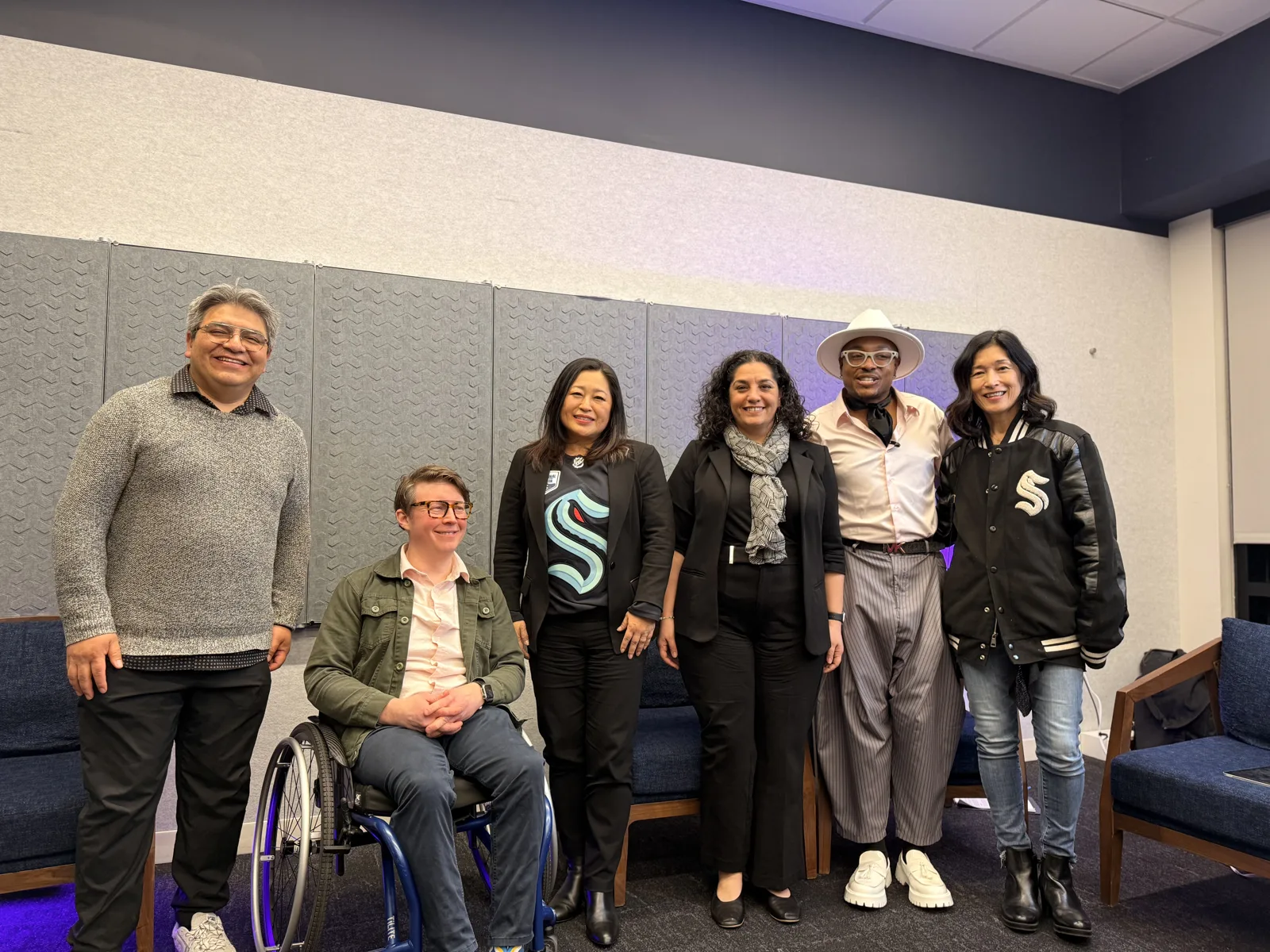 D with fellow panelists after a session